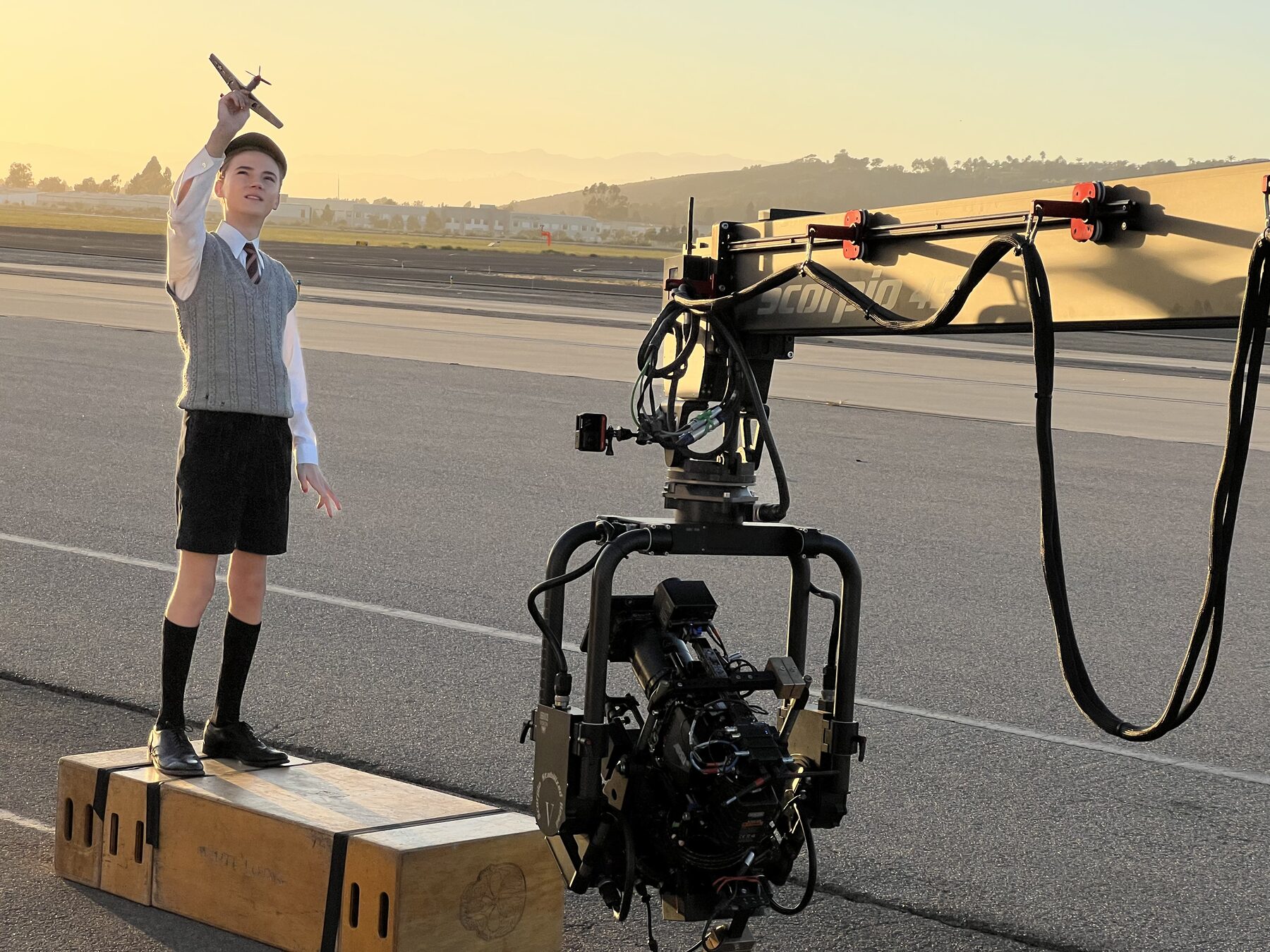 Period costume shoot on an airfield tarmac
