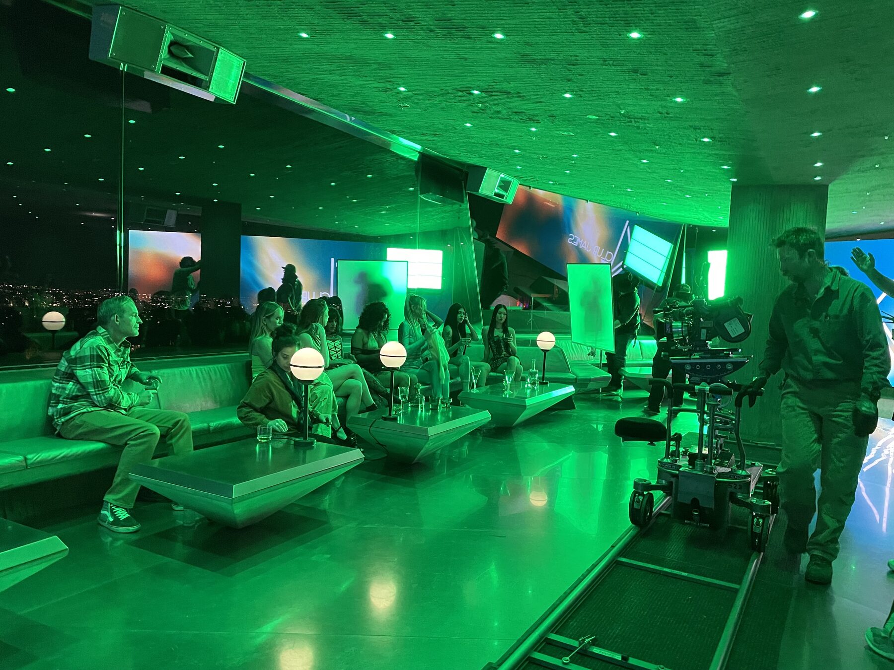 Studio-built nightclub interior lit in green